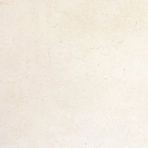 Sahara Cream limestone tile — Soft ivory cream with delicate hairline veining.