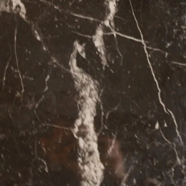 Nero Marquina Polished more selections tile — Deep black with striking white veining, polished to a high shine.