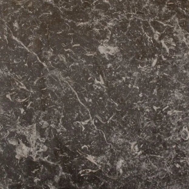 Nero Marquina Tumbled more selections tile — Charcoal black with white veining and a soft, tumbled finish.