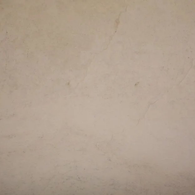 Cassia Light travertine tile — Smooth, pale greige with a calm, uniform look.