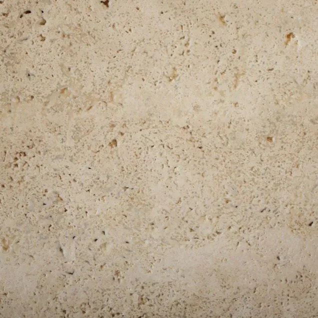 Turkish Travertine Unfilled travertine tile — Warm cream with open, unfilled pores and a rustic, natural texture.
